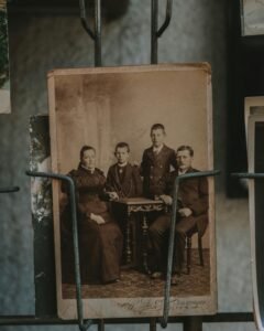 Sepia-toned photograph of a family in a vintage frame, showcasing historic memories.